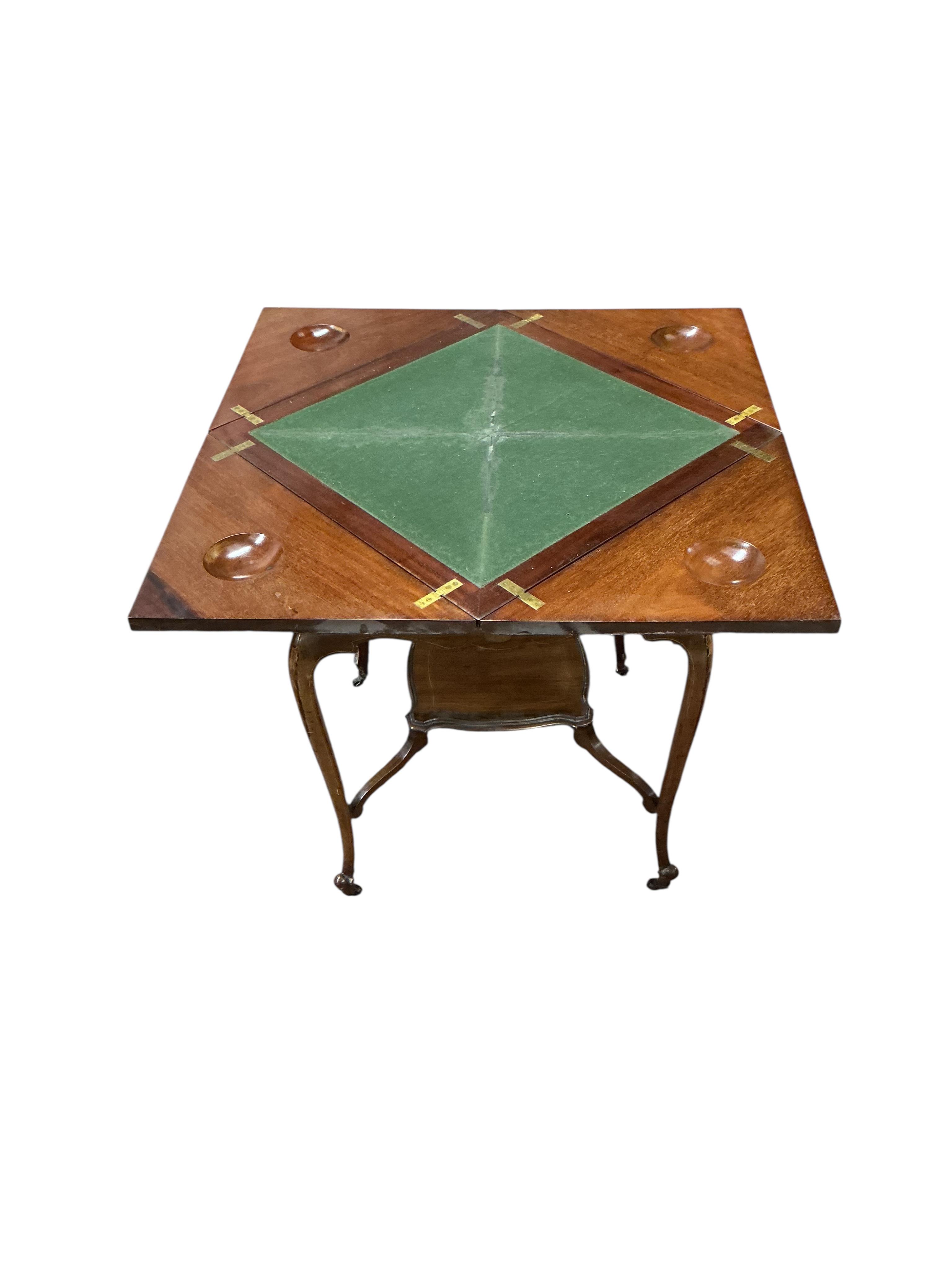 An Edwardian satinwood banded mahogany envelope card table, width 57cm, depth 57cm, height 74cm